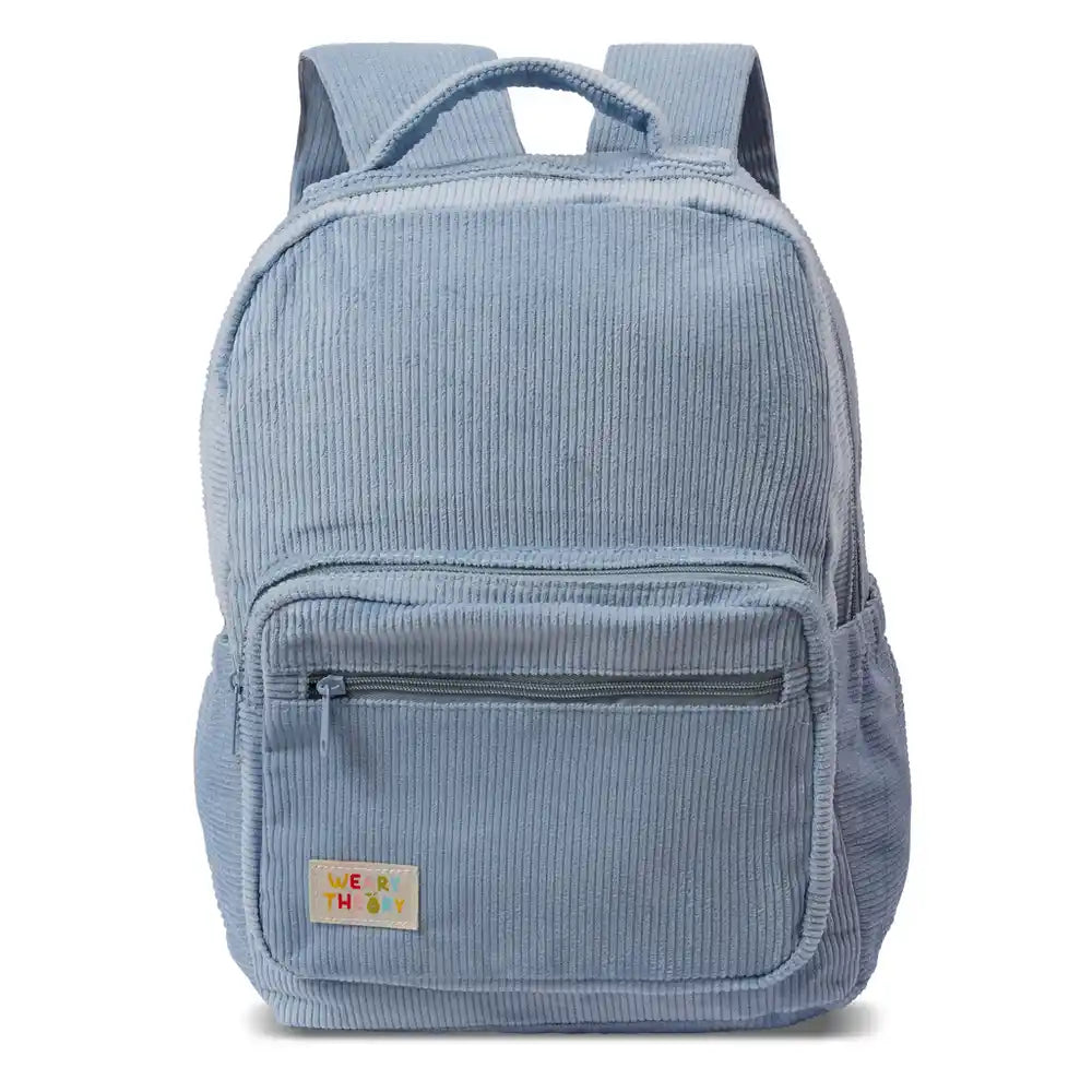 Personalised toddler backpack in corduroy – blue color. Child wearing custom name daycare backpack