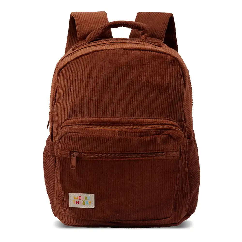 Personalised toddler backpack in corduroy – brown color. Child wearing custom name daycare backpack