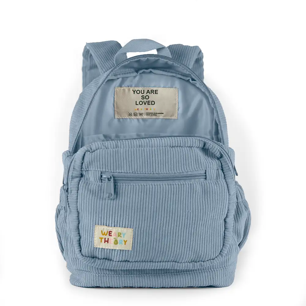 Side angle view of Blueberry Corduroy Backpack