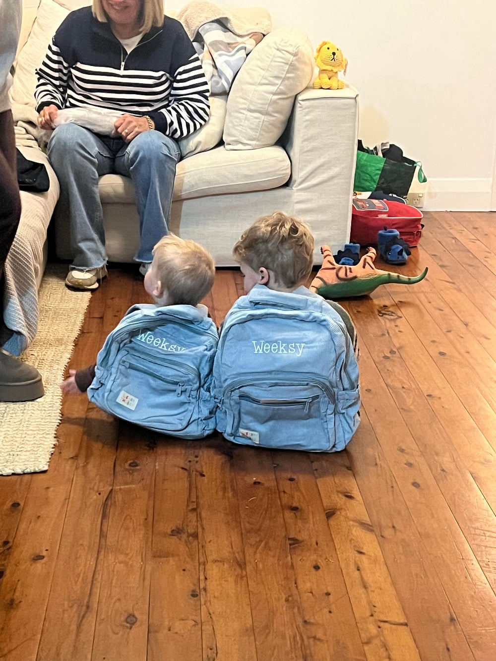 Close-up of embroidered name on personalised corduroy kids backpack